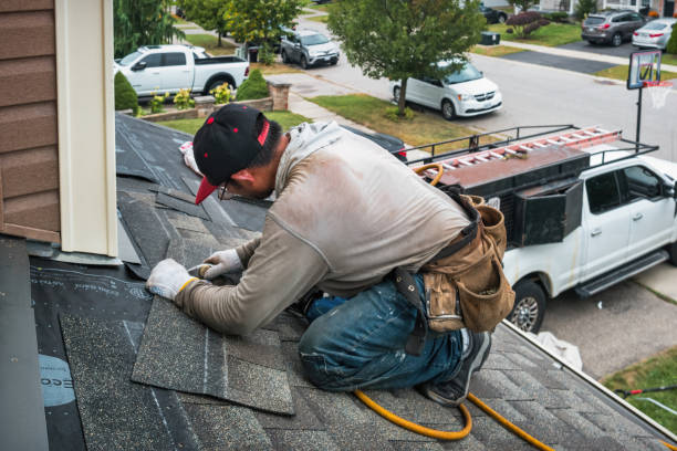 Professional Roofing technician working in Moosup, CT